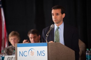 State epidemiologist Zack Moore, MD, MPH, speaks before the NCMS House of Delegates on Friday, October 24.