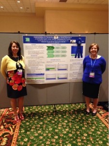 Sandra Gomez, RN (l) and Quincy Jones, PA-C with their award-winning poster.